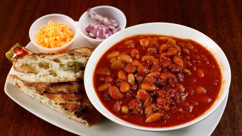 House-Made Beef Chili · Served with cheddar cheese, red onion and baguette.