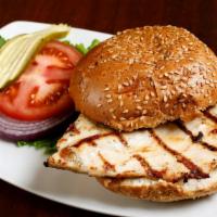 Barney’s Chicken · Flame-broiled and served on a hamburger bun. Our classic burgers are served with lettuce, re...