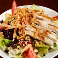 Grilled Vegetable Chicken Salad · Romaine, grilled chicken, grilled corn, zucchini, red bell pepper, tomato, sunflower seeds d...