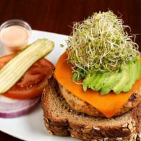 Sunshine Salmon · Avocado, sprouts, cheddar, and tomato on whole wheat toast.