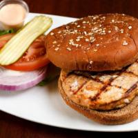 Barneys Salmon Patty · Lettuce, red onion, tomato, and pickle on a whole wheat bun.