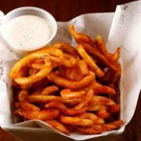 Barney's Famous Seasoned Curly Fries · Seasoned to perfection and served alongside our housemade ranch dressing.