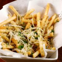 Truffle French Fries · Tossed in truffle oil, parsley, sea salt, parmesan cheese.