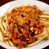 Chili Cheese Fries · Our housemade beef chili topped with cheddar cheese and chopped onion on the side.