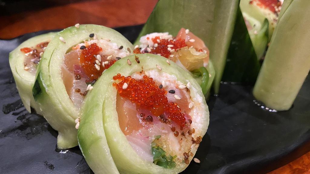 Naruto Roll · Tempura shrimp, unagi, salmon, tuna, hamachi, wrapped in cucumber, topped with seaweed salad & tobiko.