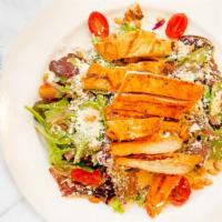 Grilled Chicken Salad · Mixed greens, grilled chicken, tomatoes, crumbled feta cheese, parmesan - tossed in aged whi...