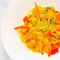 Saffron Cappellini with Tiger Prawns · Angel hair pasta served with sautéed tiger prawns, vine ripe tomatoes, fresh garlic, capers ...