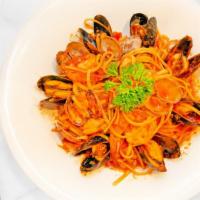Linguine Frutti di Mare · Linguine served with fresh garlic, clams, mussels, shrimp in a spicy tomato sauce.