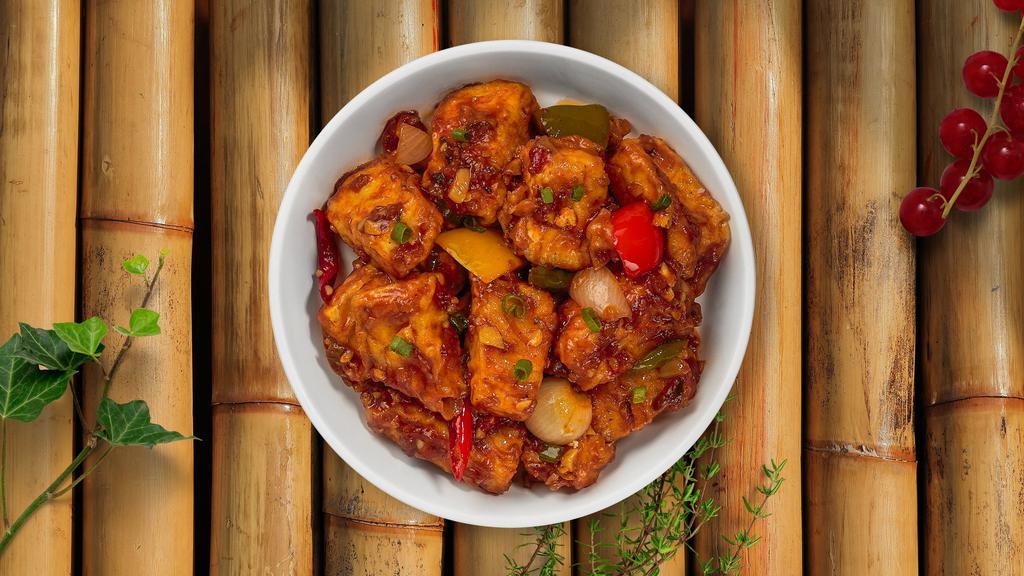Chili Slam Paneer · Battered pieces of cottage cheese stir-fried with bell pepper, onions, and tomatoes.
