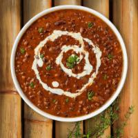 Mister Dal Makhani · Creamed lentils delicately cooked with Indian spices.