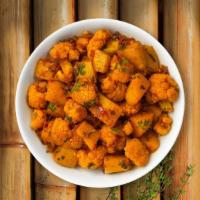 Aloo Gobi Away · Fresh cauliflower with sautéed potatoes. Stir fried with spices.