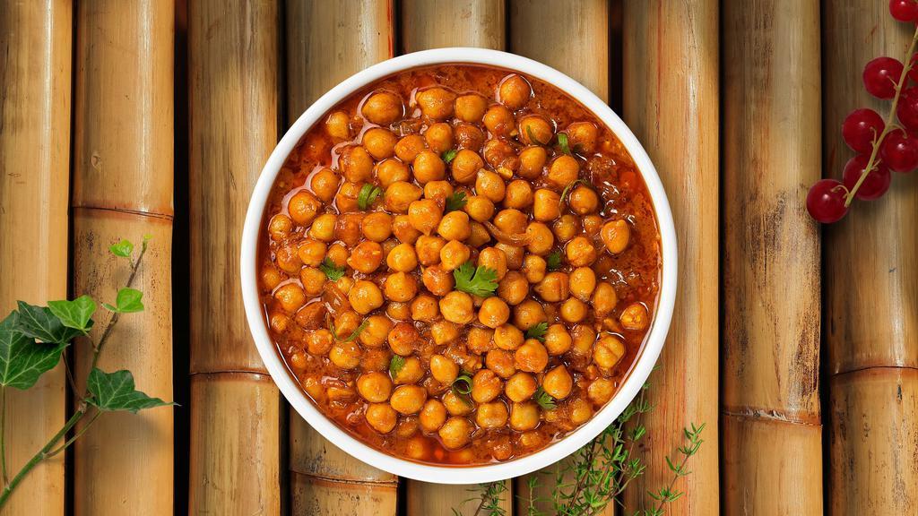 Chana Masala · Garbanzo beans cooked in Indian spices.