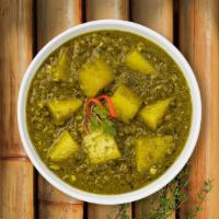 Saag For Aloo · Potatoes with spinach cooked in Indian spices.