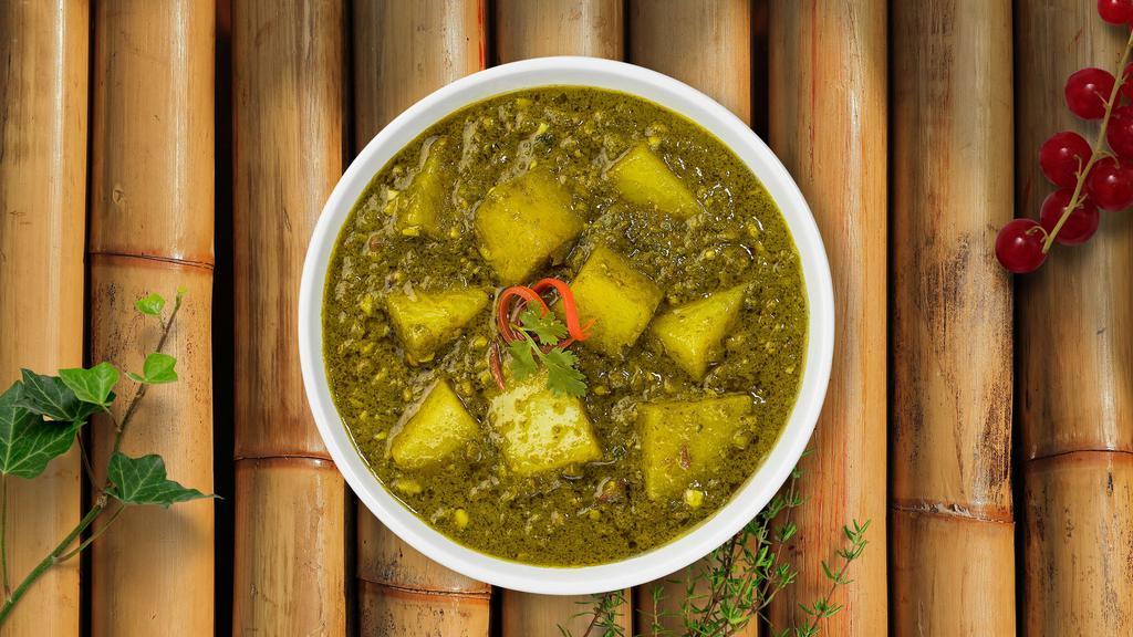 Saag For Aloo · Potatoes with spinach cooked in Indian spices.