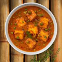 Creamy Matar Paneer · Cubes of cottage cheese and green peas cooked in creamy curry.