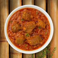 Curry Of The Lamb · Lamb simmered in exotic curry.