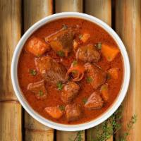 Lala Lamb Vindaloo · Boneless lamb with potatoes cooked in a hot spicy curry.