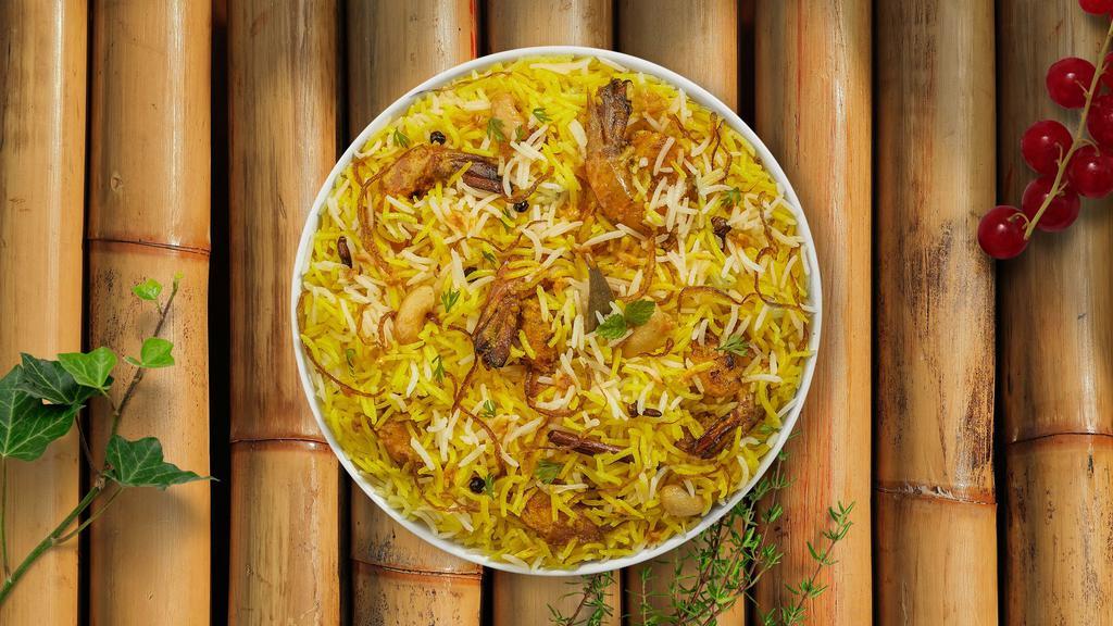 Prawn At Dawn Biryani  · Basmati rice cooked with shrimp, nuts, and spices.