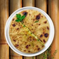 Aloo Paratha · Paratha bread stuffed with mildly spiced potatoes.