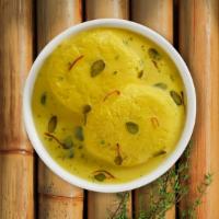 Rasmalai · Cottage cheese soaked in sweetened thick milk.