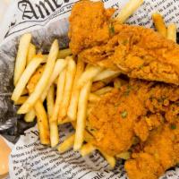 Chicken Tenders and Fries · Fried chicken tenders with fries