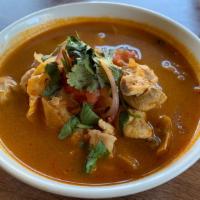 15. Tom Yum · Spicy and sour chicken soup with lemongrass and mushrooms.