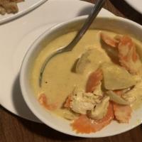 20. Yellow Curry · Choice of protein with mild turmeric yellow curry, coconut milk, carrot, onions, and potatoes.