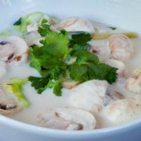 7. Chicken Tom Kha · Free-range hormone-free chicken in mild coconut soup with galangal, Cabbage, lemongrass, and...