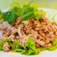 SA5. Larb Salad · Spicy. Your choice of chicken or tofu cooked with red onions, cilantro, spring onions, cilan...