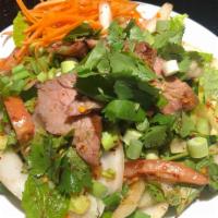 SA2. Spicy Sirloin Salad · Spicy. Spicy grilled sliced beef sirloin tosses with lemongrass, cucumbers, tomatoes, onions...