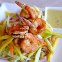 SA7. Mango Salad (Seasonal) · Green apples, green mangos, carrots, red onions, cashew nuts, and prawns, served with house ...