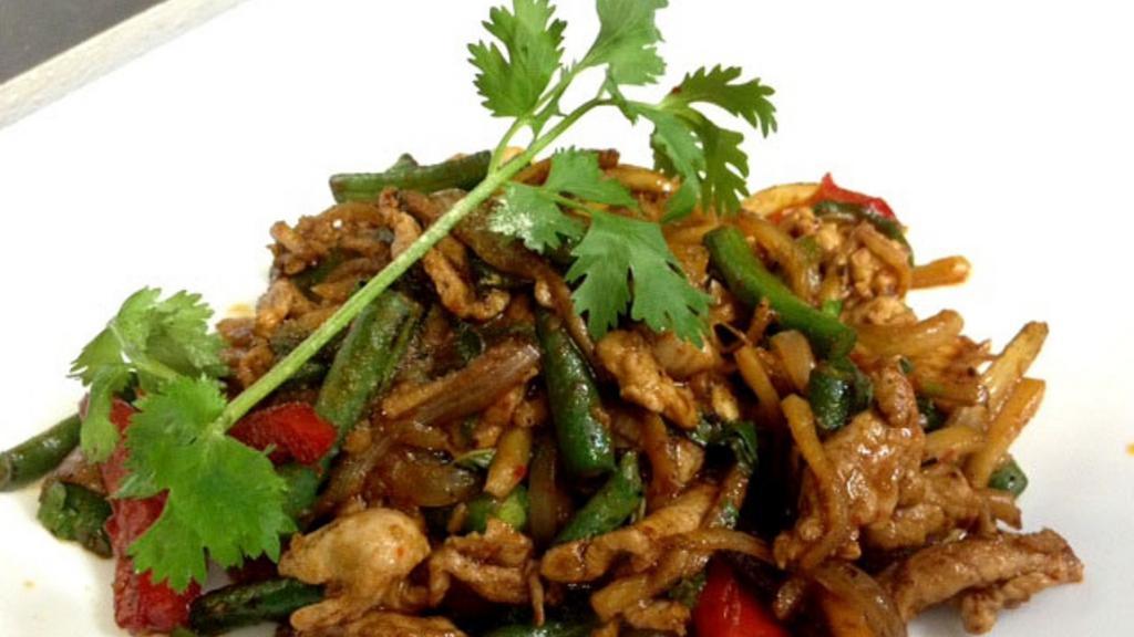 W1. Pad Kra Prow · Spicy. Bell peppers, jalapeño, Thai basil, onions, bamboo shoots, green beans, sautéed in spicy garlic chilies soy sauce with a choice of chicken, pork, beef, tofu, prawns, or seafood.