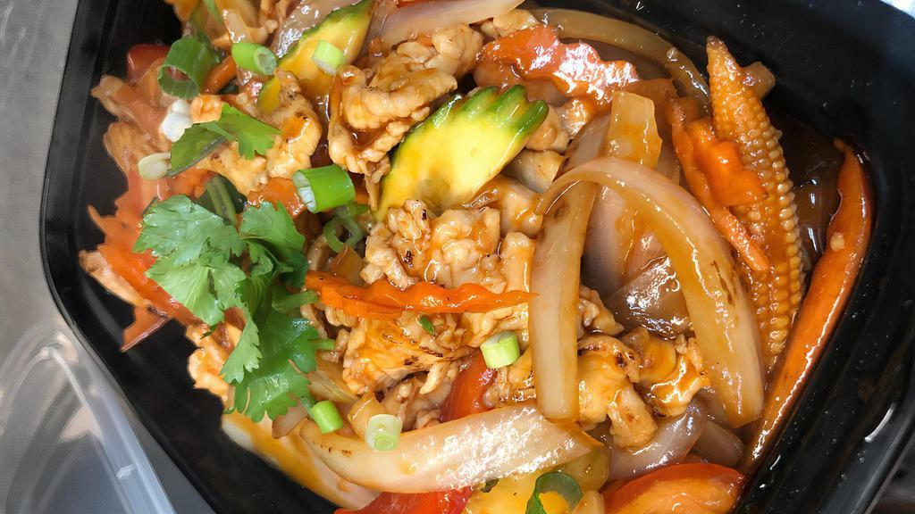 W3. Sweet & Sour · Cucumber, tomatoes, pineapples, baby corn, onions, and green onions sautéed with Thai style sweet and sour sauce with a choice of chicken pork, beef, tofu, prawns, or seafood.