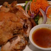G1.Fried Chicken · Golden fried marinated half chicken, served with salad and sweet and sour sauce.