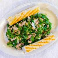 Tuna Salad · Arugula salad, tossed with tuna, cannelloni beans and shaved fennel.