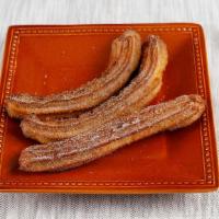 Traditional Churros with Cinnamon · Traditional Sweet Churros topped with cinnamon.

Vegan. Churros come in orders of 3 sticks (...
