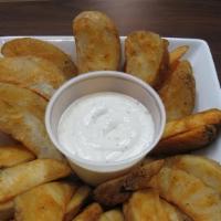 Oven Baked Potato Wedges · with your choice  a side of ketchup or ranch.