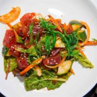 Poke Salad (RAW) · spring mix, onions, cucumber, with house made spicy soy dressing(SPICY). Pair well with  sus...