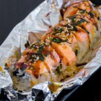 Lion King Roll · Baked salmon on CA roll(crab,avocado,sesame). (One of our most ordered rolls)