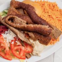 10. Gyros Plate · Salad, hummus, house rice, house potato, tzatziki, and special dressing.