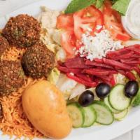 26. Falafel Plate (6 Pieces) · Salad, hummus, house rice, house potato, tzatziki, and special dressing.