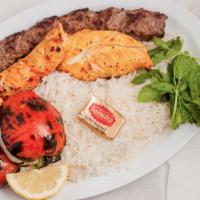 39. Combo Kabob Over Rice (Thigh) · One skewer beef kabob and one skewer chicken thigh.