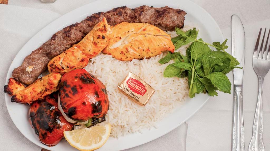 39. Combo Kabob Over Rice (Thigh) · One skewer beef kabob and one skewer chicken thigh.