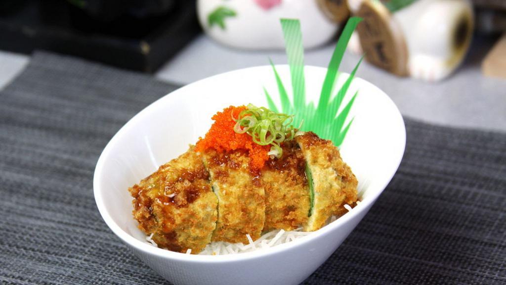 8. The Bomb · Deep fried jalapeño stuffed with spicy tuna, crab and spicy sauce.