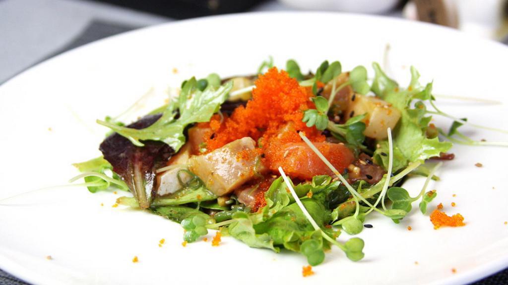 Poke Sashimi Salad · Assortment of sliced fish, spring mix with spicy poke dressing.