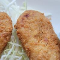 Croquette · Fried mashed potatoes with vegetables.
