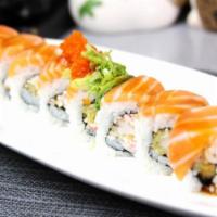 Giant Roll · Spicy tuna, crab meat, shrimp tempura, topped with salmon and avocado.