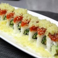 Bad Boy Roll · Shrimp tempura, cucumber topped spicy tuna crunch, special sauce.