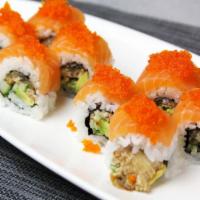 Lucky 8 Roll · Unagi, avocado, cucumber topped with salmon and tobiko.