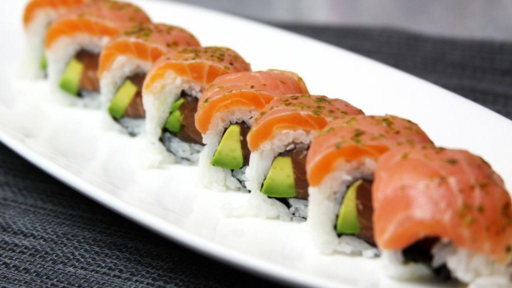 13. Dill Salmon Roll · Salmon, avocado, toped with dill and salmon.